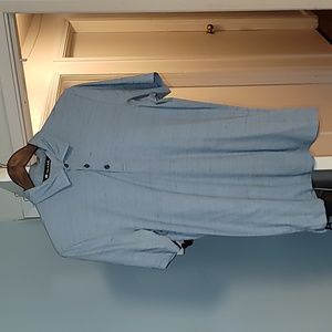 Travis Mathew polo shirt. Light Blue